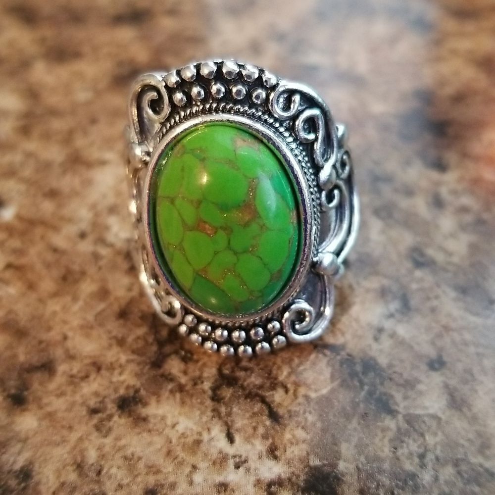 Inlaid turquoise egg shape carved ring size 8